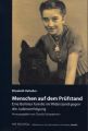 Menschen auf dem Prüfstein
